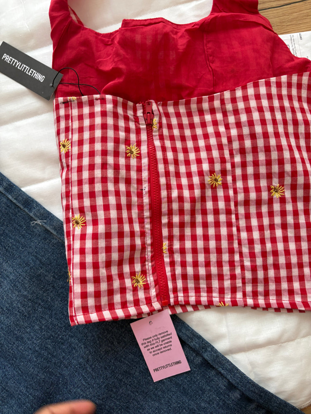 Red gingham flower embroidered top