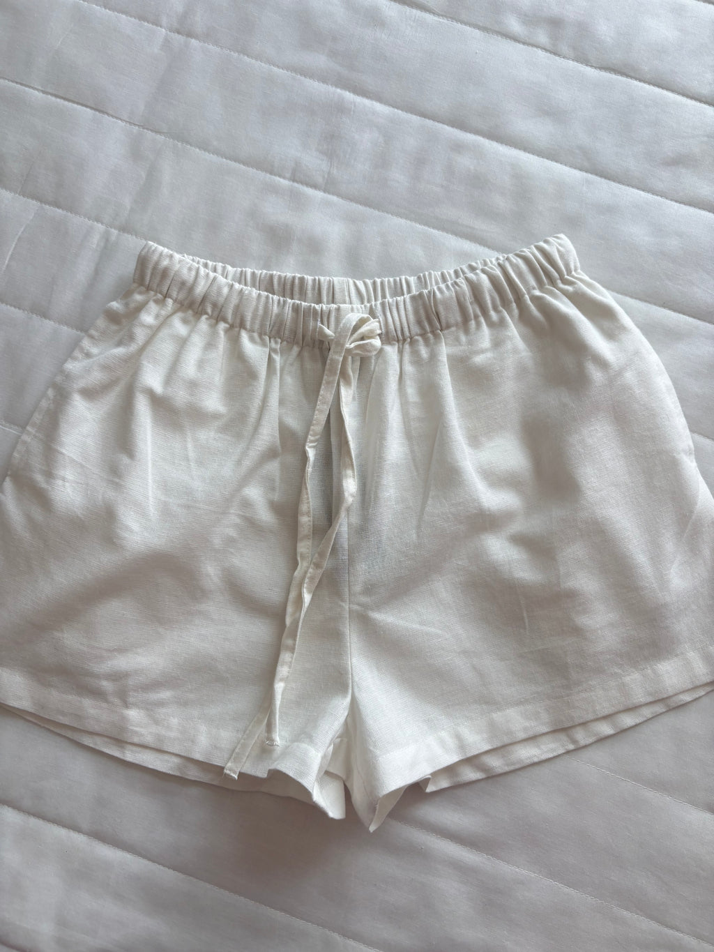Cotton and linen White top and shorts (sold individually)