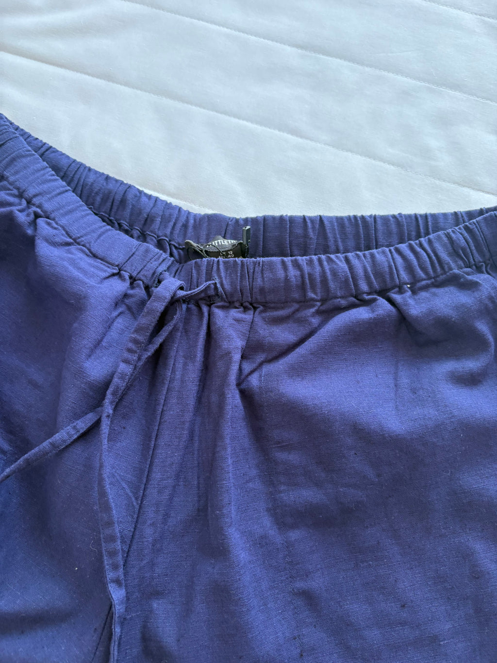 White tube beads top and blue pant(individually sold)
