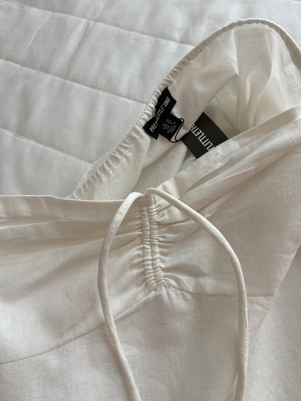Cotton and linen White top and shorts (sold individually)