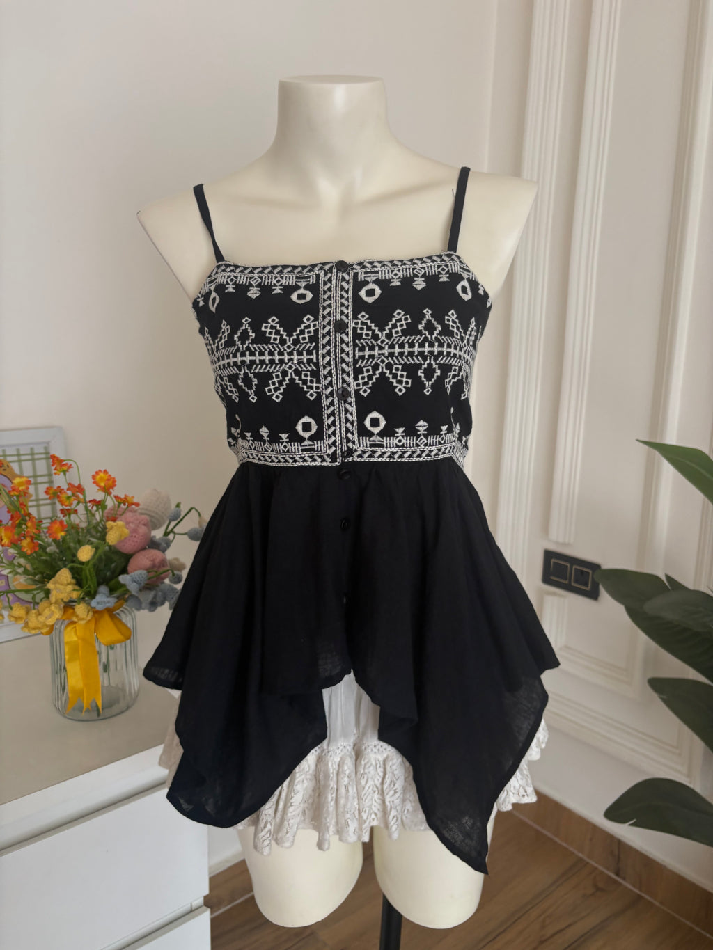 Black embroidered asymmetrical top