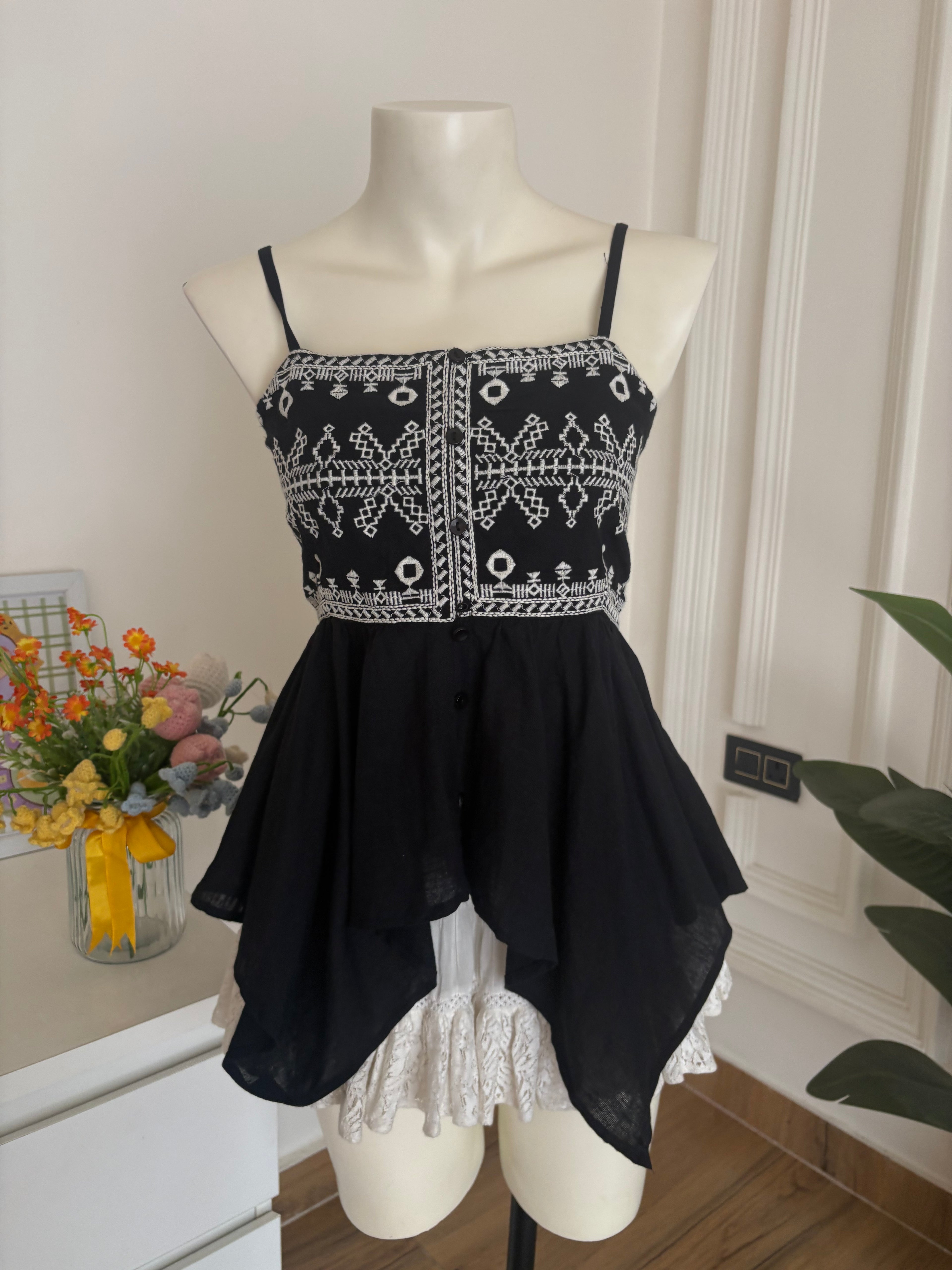Black embroidered asymmetrical top