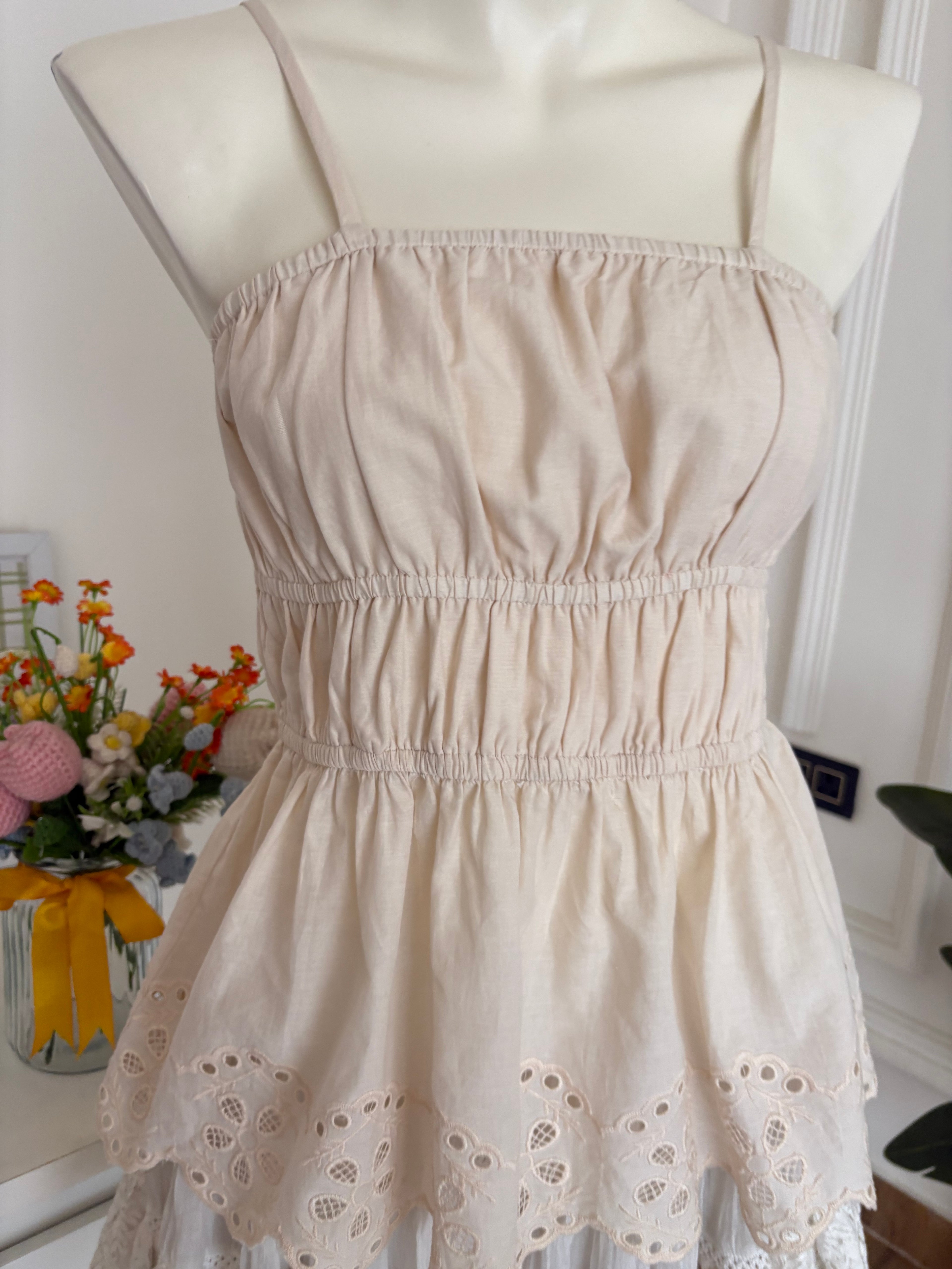 beige top
